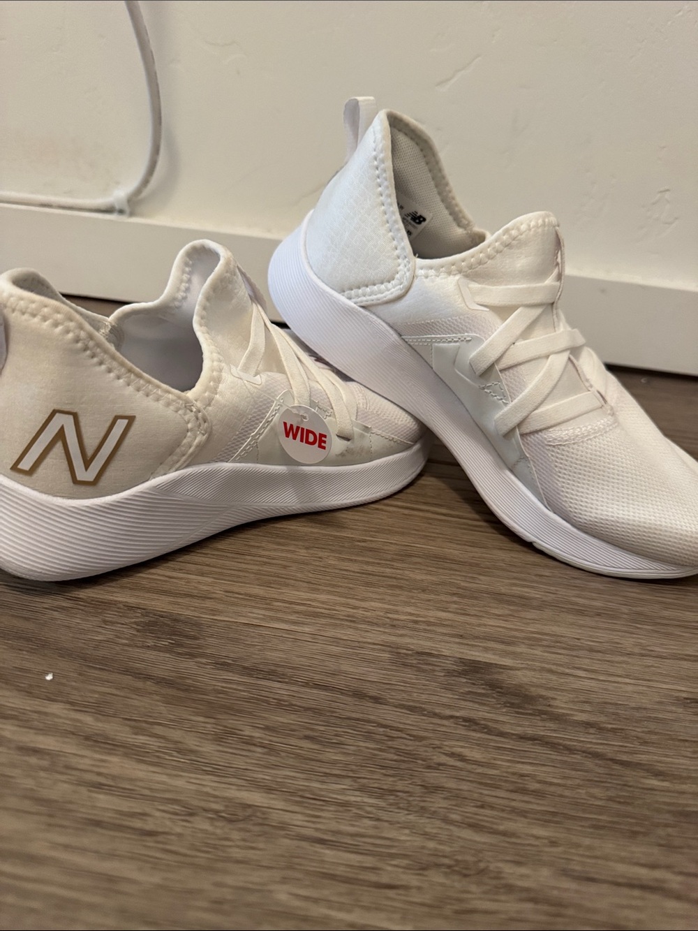 New Balance White Athletic Slip-On Sneakers with Gold Logo